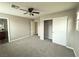 Bedroom with ceiling fan and open closet, a comfortable and practical space at 2922 Tranquil Brook Ave, Henderson, NV 89044