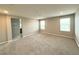 Large, carpeted bedroom with plenty of light and space at 2922 Tranquil Brook Ave, Henderson, NV 89044