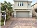 Charming two-story home with a two-car garage and a beautifully paved driveway at 2922 Tranquil Brook Ave, Henderson, NV 89044