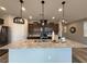 A view of the kitchen featuring stainless steel appliances, a large island, and pendant lights at 2922 Tranquil Brook Ave, Henderson, NV 89044