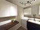 Bright laundry room with modern appliances, countertop space, and stylish decor at 2922 Tranquil Brook Ave, Henderson, NV 89044