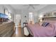 Bedroom with hardwood floors, walk-in closet, neutral paint, and large bed at 2969 Sumter Valley Cir, Henderson, NV 89052
