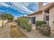 Private backyard space featuring a walkway, mature landscaping, and patio area offering a serene outdoor retreat at 3609 Laguna Del Sol Dr, Las Vegas, NV 89121