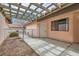 Private courtyard with a lattice-covered patio providing shade and a relaxing outdoor space at 3609 Laguna Del Sol Dr, Las Vegas, NV 89121