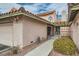 Inviting single-story home entrance featuring a private courtyard and well-maintained desert landscaping at 3609 Laguna Del Sol Dr, Las Vegas, NV 89121