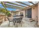 Outdoor patio featuring stylish furniture and a pergola, ideal for relaxation and entertaining at 3609 Laguna Del Sol Dr, Las Vegas, NV 89121