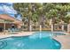 Community swimming pool with hot tub and ample lounge chairs, perfect for relaxation and recreation at 3609 Laguna Del Sol Dr, Las Vegas, NV 89121