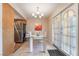 Bright dining area with tile floors and contemporary glass table at 4097 Nook Way # A, Las Vegas, NV 89103