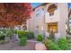 Attractive two-story building with well-maintained landscaping and mature trees at 4097 Nook Way # A, Las Vegas, NV 89103