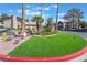 Beautifully maintained landscaping at the entrance of the community offers a welcoming scene at 4097 Nook Way # A, Las Vegas, NV 89103