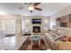 Cozy living room featuring a fireplace, tile floors, and modern décor at 4097 Nook Way # A, Las Vegas, NV 89103