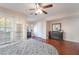 Inviting main bedroom with hardwood floors, natural light, and ample closet space at 4097 Nook Way # A, Las Vegas, NV 89103
