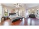 Spacious main bedroom featuring hardwood floors, natural light, and stylish decor at 4097 Nook Way # A, Las Vegas, NV 89103