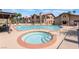 Community pool and spa with lounge seating and meticulously kept grounds in a desert setting at 4097 Nook Way # A, Las Vegas, NV 89103