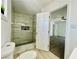Modern bathroom boasts a glass-enclosed shower, niche, and access to bedroom at 4324 El Conlon Ave, Las Vegas, NV 89102