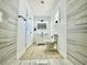 Bathroom featuring modern tiled shower, white vanity, and wood-look floors at 4324 El Conlon Ave, Las Vegas, NV 89102