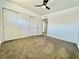 A basic bedroom featuring a closet and ceiling fan at 4324 El Conlon Ave, Las Vegas, NV 89102