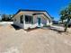 Charming home featuring updated landscaping, fresh paint, and a vibrant blue front door at 4324 El Conlon Ave, Las Vegas, NV 89102