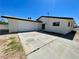 Ranch-style home with a large driveway and attached garage at 4324 El Conlon Ave, Las Vegas, NV 89102