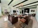 Spacious living room features black beams, fireplace and stylish furnishings at 4324 El Conlon Ave, Las Vegas, NV 89102
