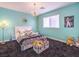 Bright, playful bedroom with unique lighting, colorful decorations, and a cozy ambiance at 5 Clear Crossing Trl, Henderson, NV 89052