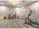 Versatile bonus room featuring an elliptical machine and workspace at 5 Clear Crossing Trl, Henderson, NV 89052