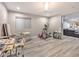 Bright bonus room with exercise equipment and crafting area at 5 Clear Crossing Trl, Henderson, NV 89052