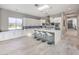 Bright kitchen with modern cabinets, an island with seating, and stainless steel appliances at 5 Clear Crossing Trl, Henderson, NV 89052