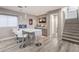 An open living space boasts a sleek bar area with seating and modern lighting at 5 Clear Crossing Trl, Henderson, NV 89052