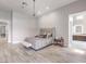 Spacious bedroom with en-suite bathroom access, light floors, and lots of light at 5 Clear Crossing Trl, Henderson, NV 89052