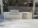 Outdoor kitchen featuring stainless steel grill, built-in cooler, and sleek counter design for outdoor cooking at 5 Clear Crossing Trl, Henderson, NV 89052