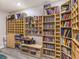 Built-in wooden storage, including bookshelves and cubbies, in the storage room at 5 Clear Crossing Trl, Henderson, NV 89052