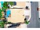 Aerial view showing a pristine backyard pool, lush greenery, and a well-maintained property at 5 Red Fawn Ct, Henderson, NV 89074