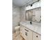 Modern bathroom featuring an extended vanity with marble countertops and modern fixtures at 5 Red Fawn Ct, Henderson, NV 89074