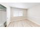 Bright bedroom featuring a window, modern floors and closet at 5 Red Fawn Ct, Henderson, NV 89074