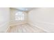 A bedroom offering lots of natural light from the lovely arched window at 5 Red Fawn Ct, Henderson, NV 89074