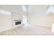 The bright living room features a modern fireplace, large windows, and access to the backyard at 5 Red Fawn Ct, Henderson, NV 89074