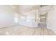 Open-concept living area with wood-look flooring, lots of light and views to other rooms at 5 Red Fawn Ct, Henderson, NV 89074