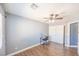 Bedroom with wood laminate flooring and a ceiling fan at 5031 Naff Ridge Dr, Las Vegas, NV 89131