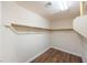 Walk-in closet with wood floors and shelving for storage at 5031 Naff Ridge Dr, Las Vegas, NV 89131