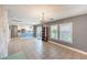 Expansive living area with tiled floors, and seamlessly connects to the kitchen area at 5031 Naff Ridge Dr, Las Vegas, NV 89131