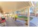 Covered patio with furniture and potted plants at 5031 Naff Ridge Dr, Las Vegas, NV 89131