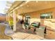 Covered outdoor patio area with backyard at 5031 Naff Ridge Dr, Las Vegas, NV 89131