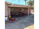 Covered patio in a yard with minimal landscaping at 5324 Del Monte Ave, Las Vegas, NV 89146