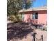 Backyard with minimal landscaping and open windows at 5324 Del Monte Ave, Las Vegas, NV 89146