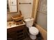 Outdated bathroom showcasing toilet, sink and vanity at 5324 Del Monte Ave, Las Vegas, NV 89146