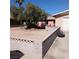 Single story house with desert landscaping and a gray concrete block wall at 5324 Del Monte Ave, Las Vegas, NV 89146