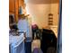 Untidy kitchen with dated appliances and clutter at 5324 Del Monte Ave, Las Vegas, NV 89146