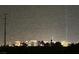Night shot captures a striking city view with illuminated buildings at 5340 Kennedy Hill Ave, Las Vegas, NV 89139