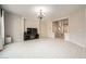 This living room has a light color palette and white tile floors at 5340 Kennedy Hill Ave, Las Vegas, NV 89139